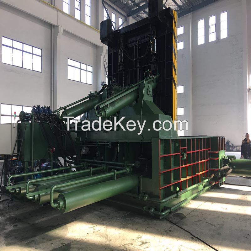 Scrap metal baler machine