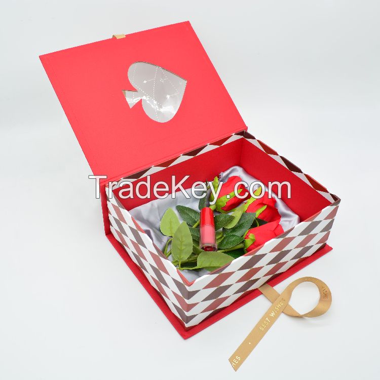 Customization cosmetic packaging embossed gold foil book shaped gift boxes with ribbon closure