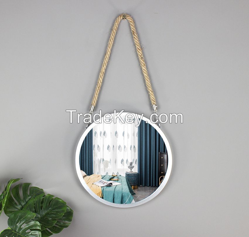 The raw-iron metal frame provides unique industrial shelving Decorative Mirror