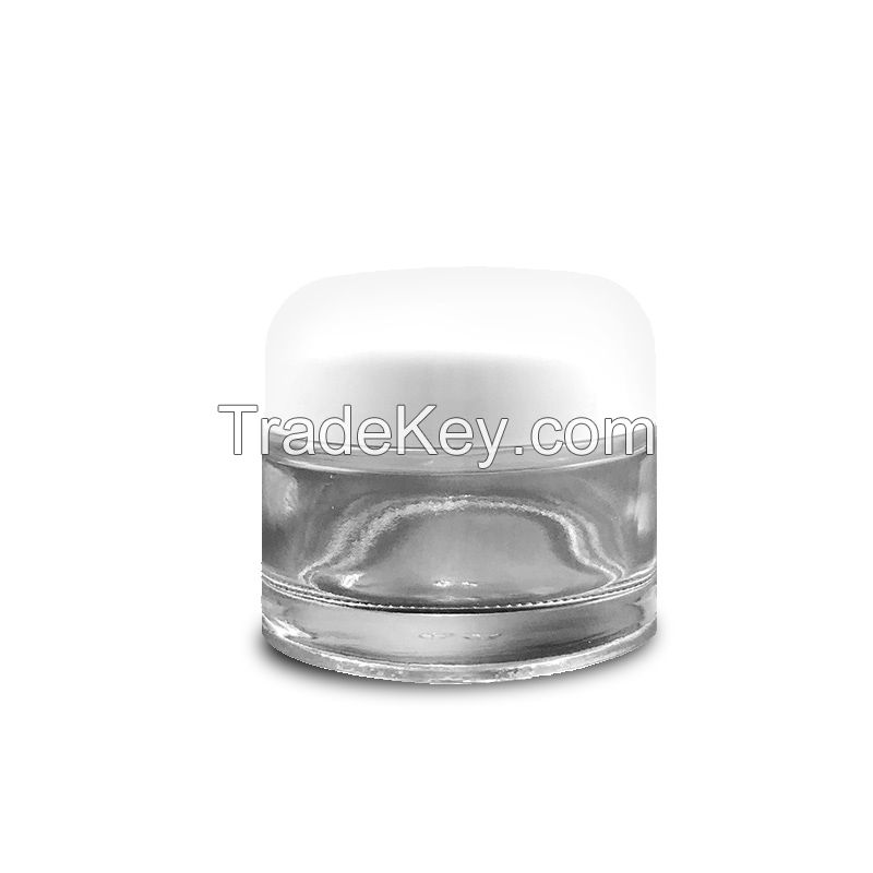 Glass cream jar with round white lid