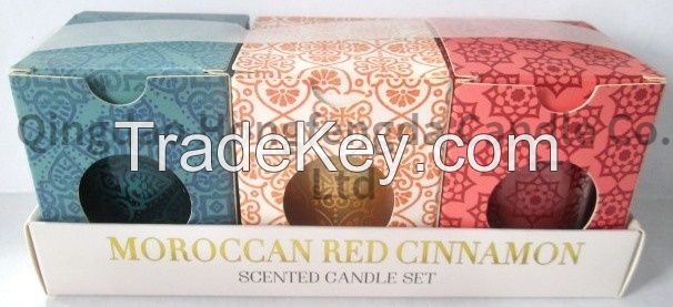 wax filled votive glass jar in card tray