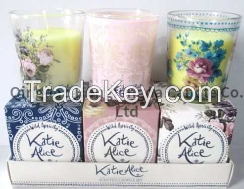 wax filled votive glass jar in card tray