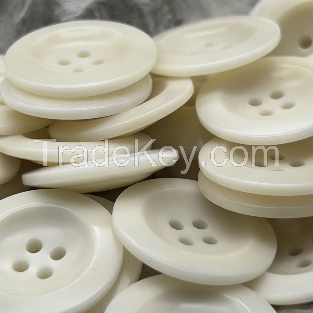 In stock bowl shape corozo buttons in in dark brown, green, white, black and ginger color