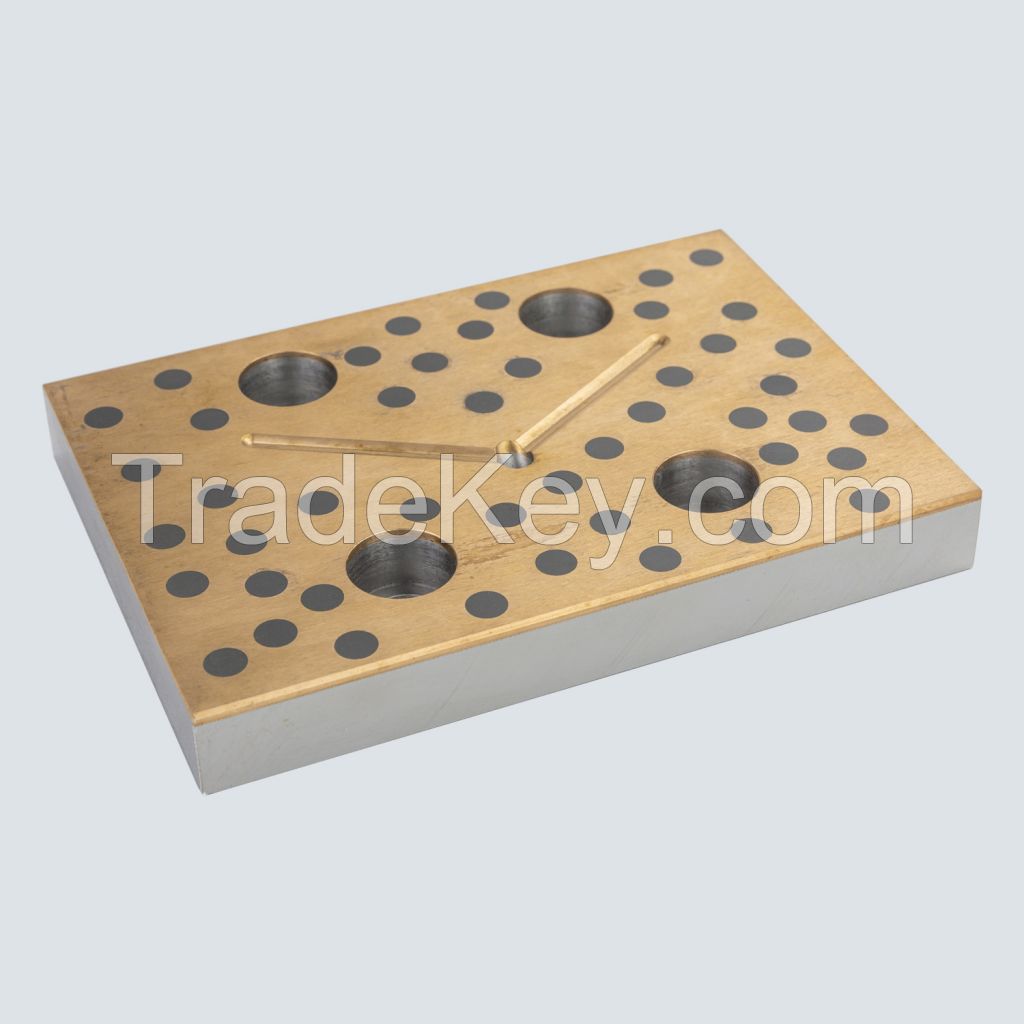 Self lubricating slide plate