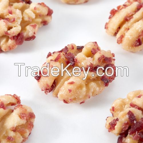 Cranberry flavored peeled walnut kernels for casual snacking