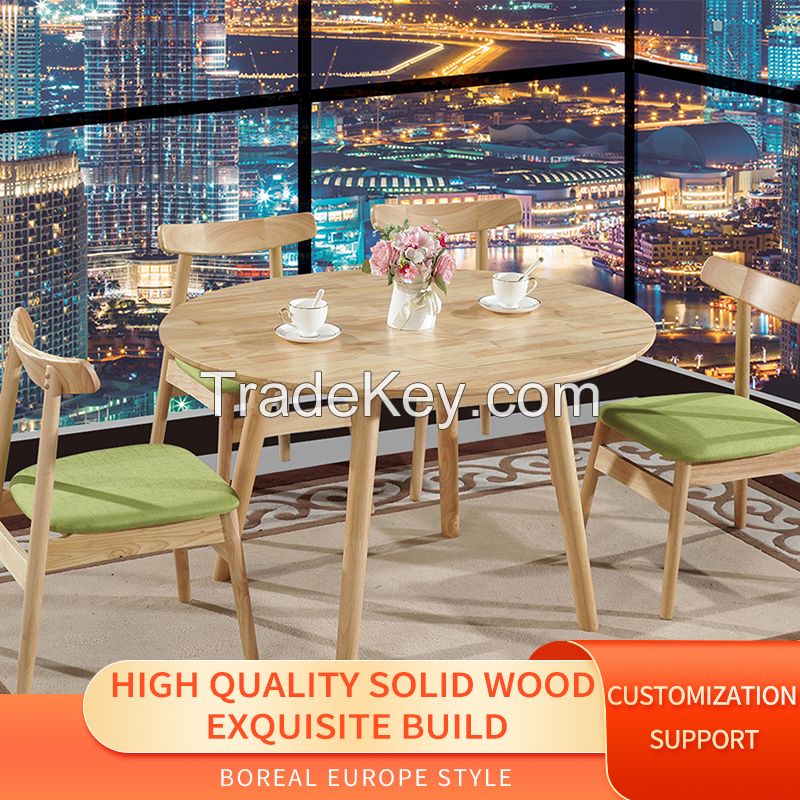 Scandinavian all solid wood dining table small dining table modern minimalist rubber wood table and chairs set.