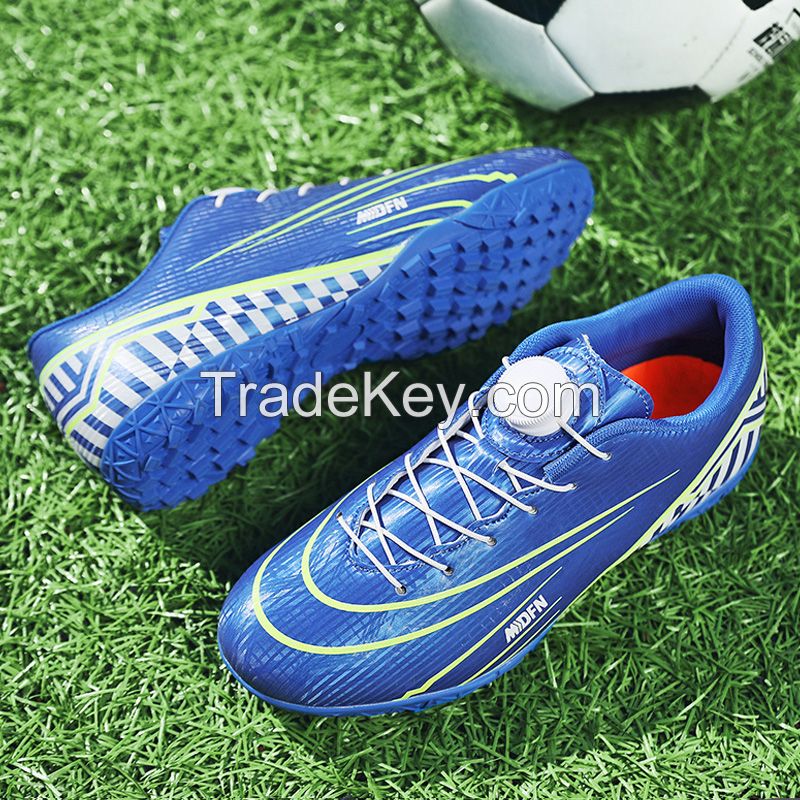 Rotating deduction football shoes dark blue/blue/pink