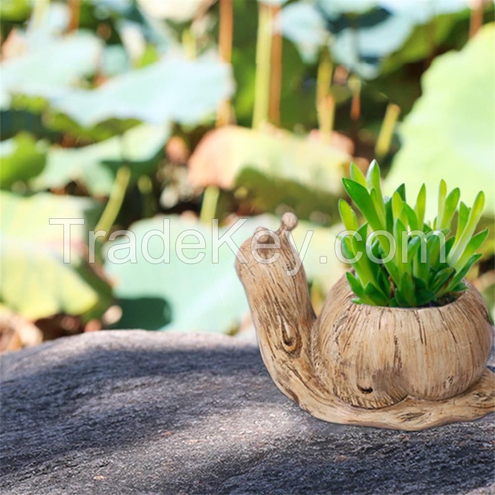 Polyresin bird/snail/rabbit planter