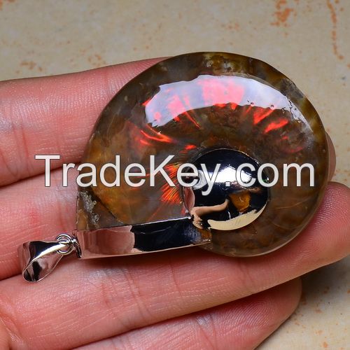 Iridescent Ammonite with blue rainbow pendant