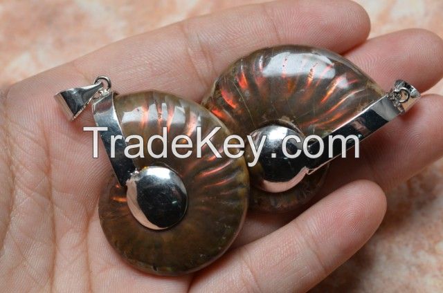 Iridescent Ammonite with blue rainbow pendant