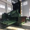 Scrap metal baler machine