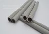 Hot gas acid gas filtration sintered porous metal filter elements 