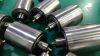 Back-up rollers for non-ferrous metals leveler