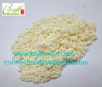 Citrus juice debittering resin