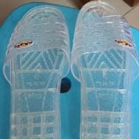 Female transparent slipper with flower