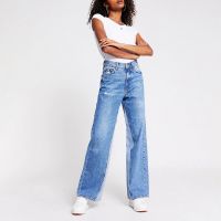 Blue wash split hem high rise jeans