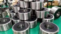 Back-up rollers for non-ferrous metals leveler