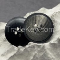 Designer style horn button ultraviolet laserd