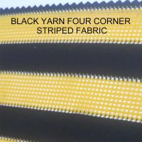 Black yarn with four corner stripes
